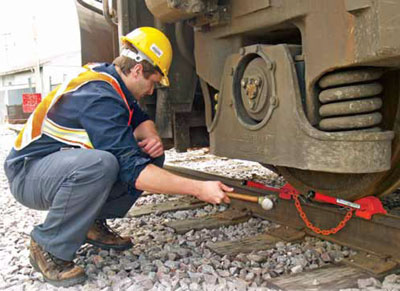 If your wheel chocks get stuck under locomotive or rail car wheels, try our Whack ‘Em chocks. Reinforced steel handles can stand up to hammer blows or yanking the handle sideways to free the chock.